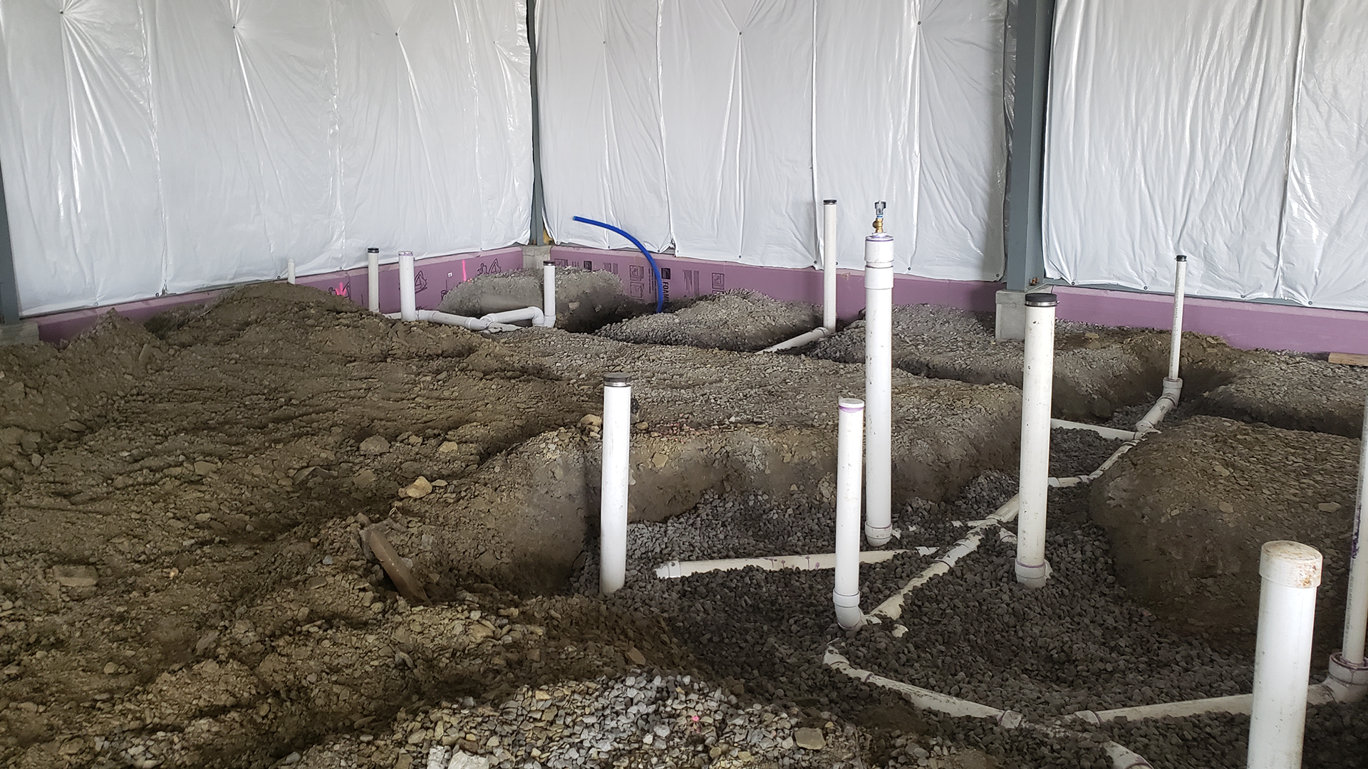 Data center cooling systems integrated into a Red Direct steel building with clear-span design and overhead air distribution