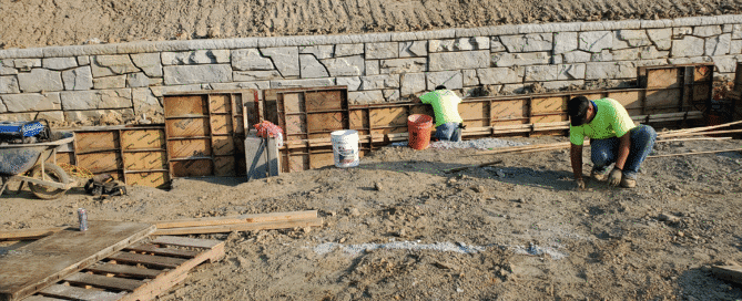 PE-licensed engineer reviewing steel building structural plans for a commercial construction project