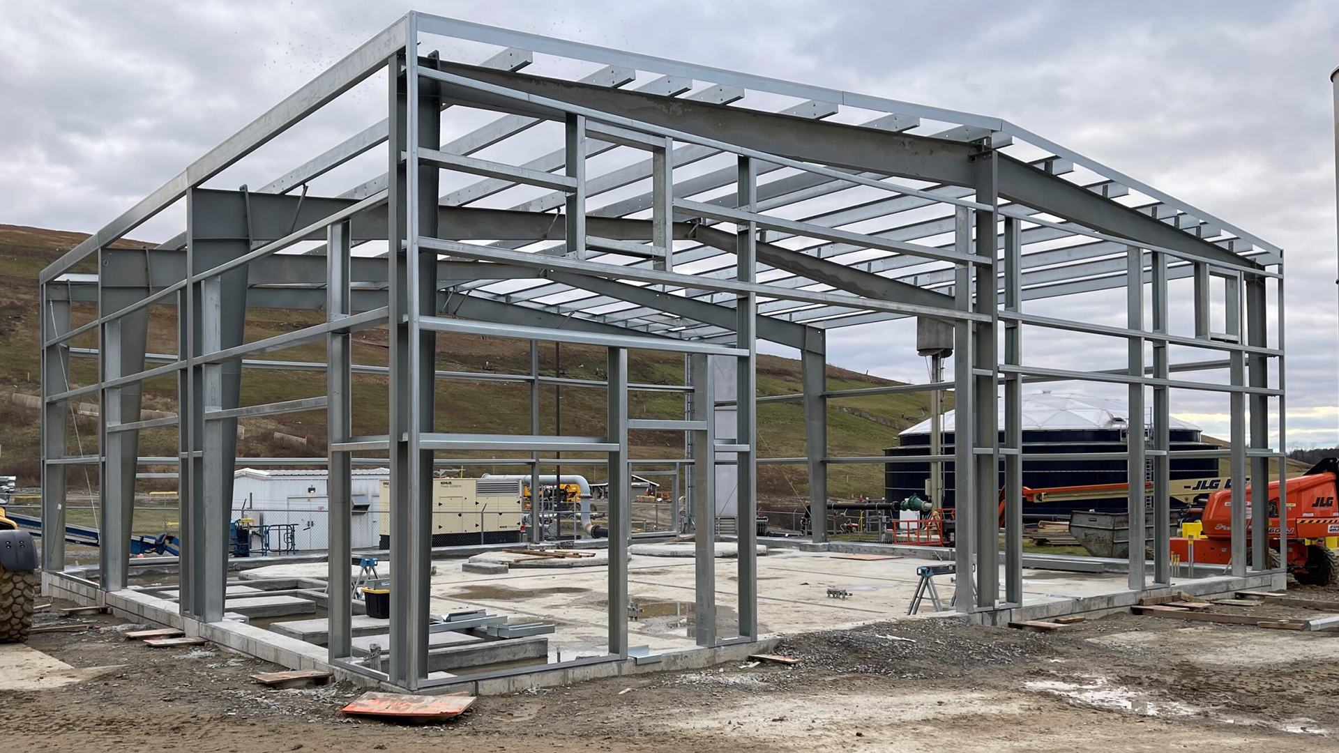 Steel building designed for a natural gas compressor station housing heavy industrial equipment and energy infrastructure systems