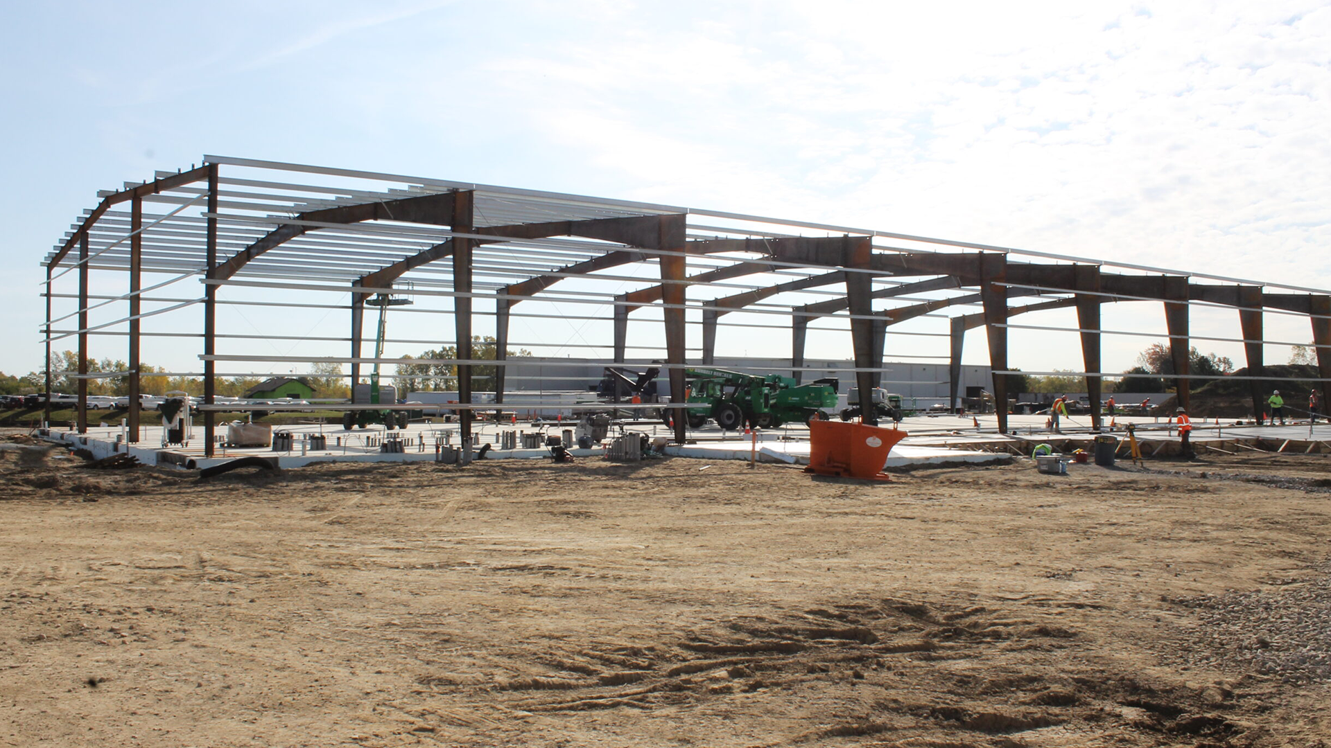 Steel metering station building protecting natural gas infrastructure equipment and midstream pipeline systems