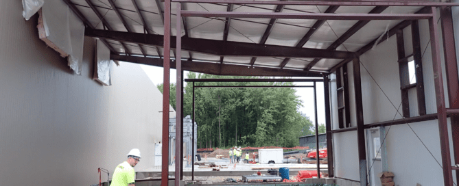Steel brewery building designed for fermentation tanks, bottling lines, and beverage production operations