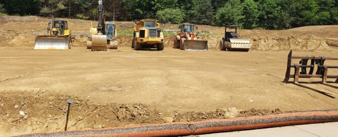 Steel midstream natural gas infrastructure facility with industrial equipment and pipeline support systems