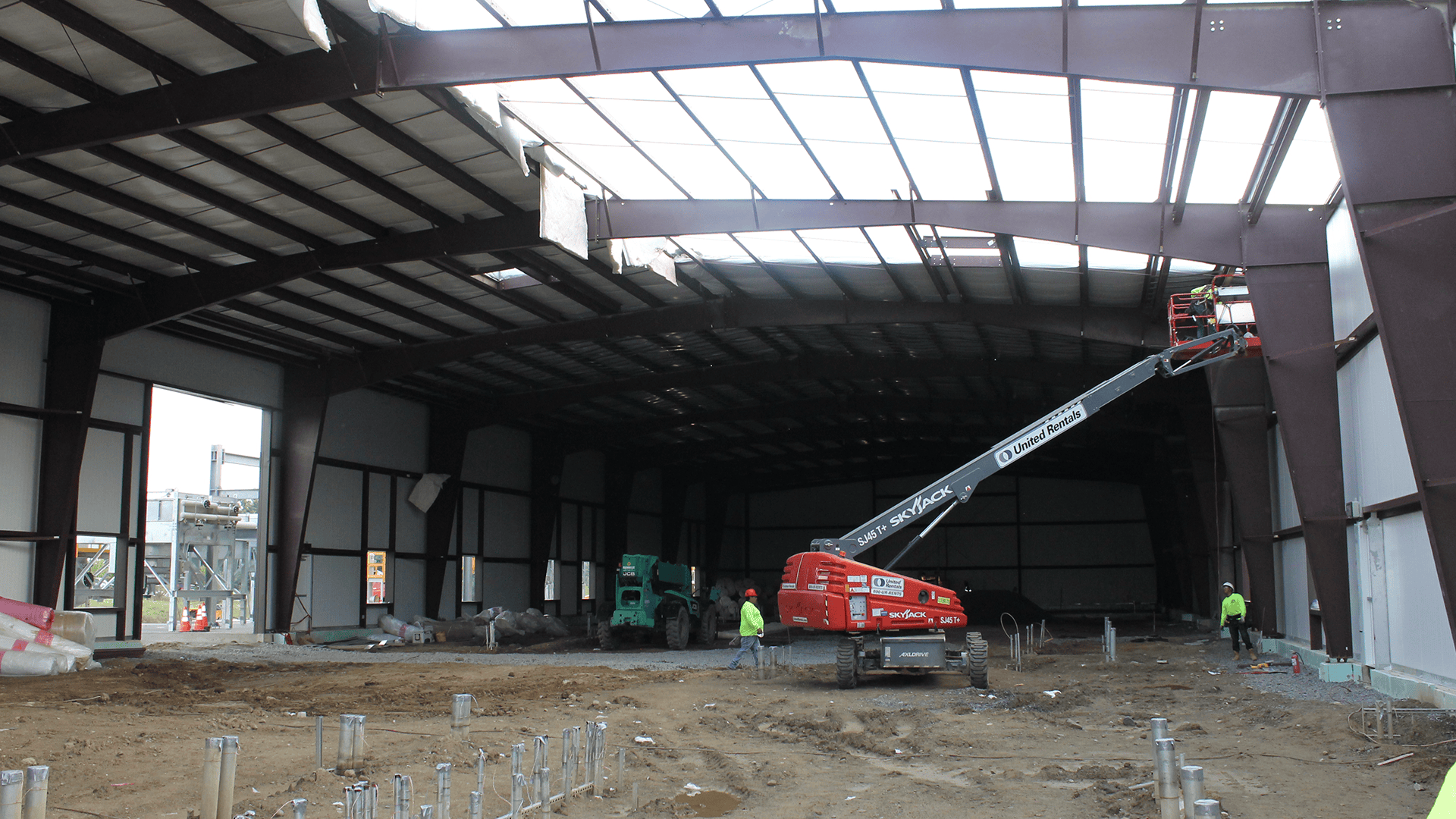 Red Direct steel cultural facility featuring modern architecture and flexible gathering spaces for museums, performance venues, and community events